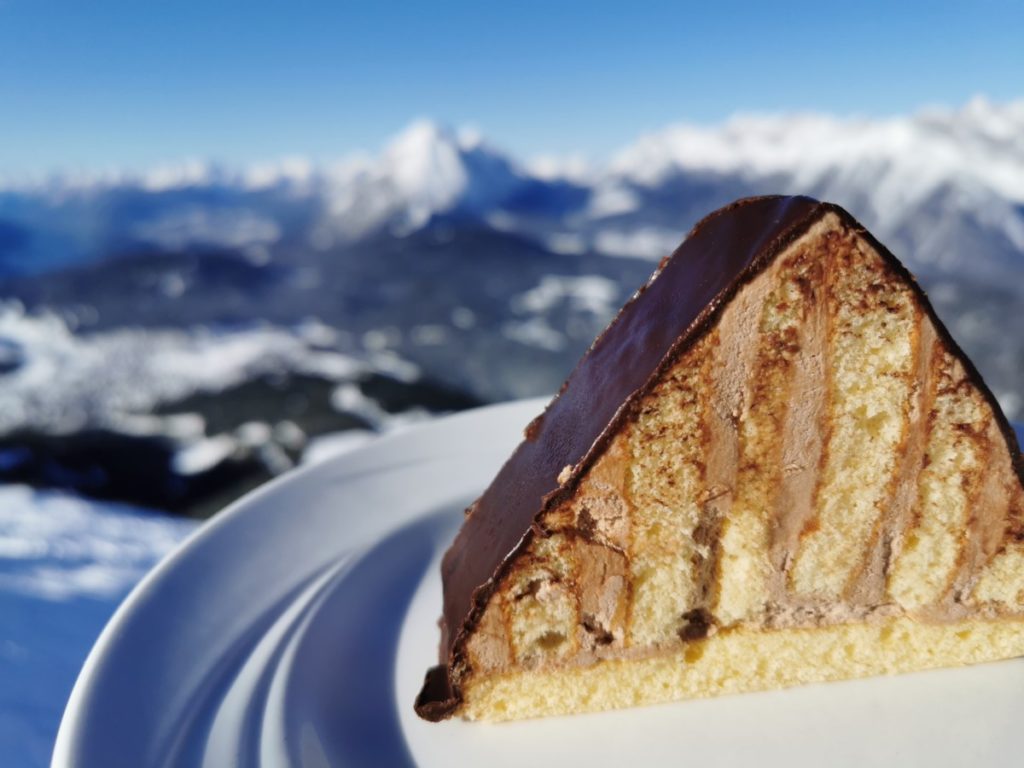 Innsbruck Skigebiet mit Kuchen am Gipfel